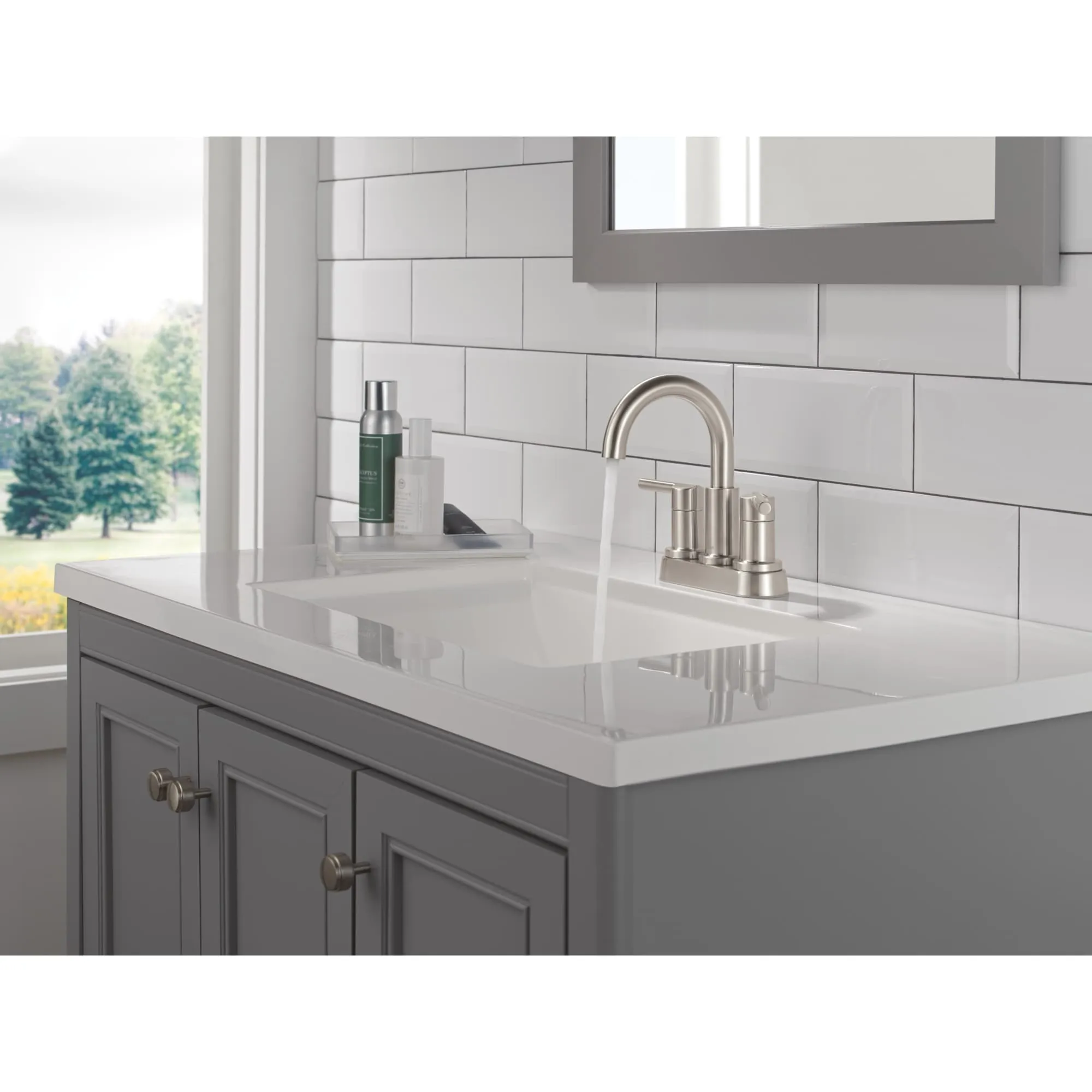 Delta 25749LF Nicoli 1.2 GPM Centerset Bathroom Faucet with Push